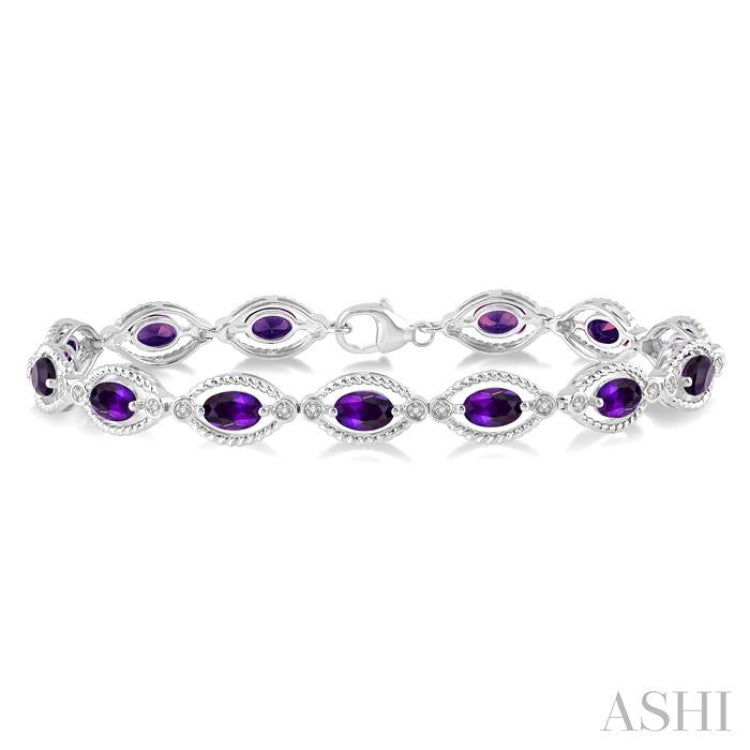 6x4 MM Oval Cut Amethyst and 1/10 Ctw Round Cut Diamond Semi-Precious Bracelet in Sterling Silver 6x4 MM Oval Cut Amethyst and 1/10 Ctw Round Cut Diamond Semi-Precious Bracelet in Sterling Silver