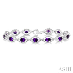 6x4 MM Oval Cut Amethyst and 1/10 Ctw Round Cut Diamond Semi-Precious Bracelet in Sterling Silver 6x4 MM Oval Cut Amethyst and 1/10 Ctw Round Cut Diamond Semi-Precious Bracelet in Sterling Silver