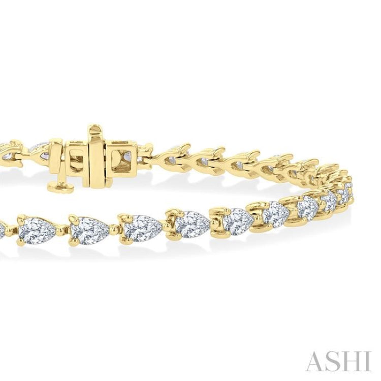 4 Ctw East West Pear Cut Diamond Fashion Tennis Bracelet in 14K Yellow Gold 4 Ctw East West Pear Cut Diamond Fashion Tennis Bracelet in 14K Yellow Gold