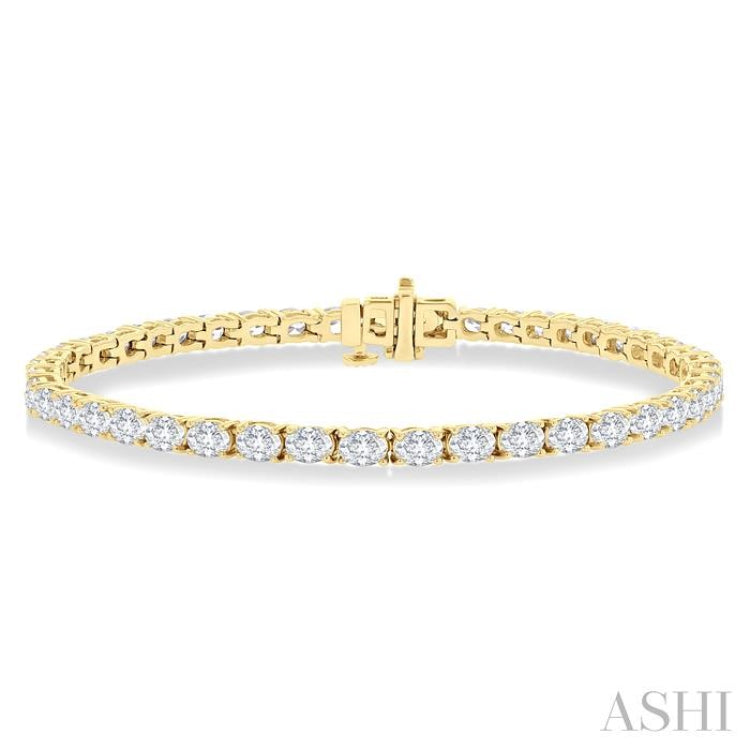 5 1/2 Ctw East West Oval Cut Diamond Fashion Tennis bracelet in 14K Yellow Gold 5 1/2 Ctw East West Oval Cut Diamond Fashion Tennis bracelet in 14K Yellow Gold