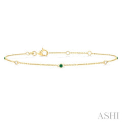 1.75 MM Emerald and 1/20 Ctw Round Cut Diamond Precious Station Bracelet in 14K Yellow Gold 1.75 MM Emerald and 1/20 Ctw Round Cut Diamond Precious Station Bracelet in 14K Yellow Gold