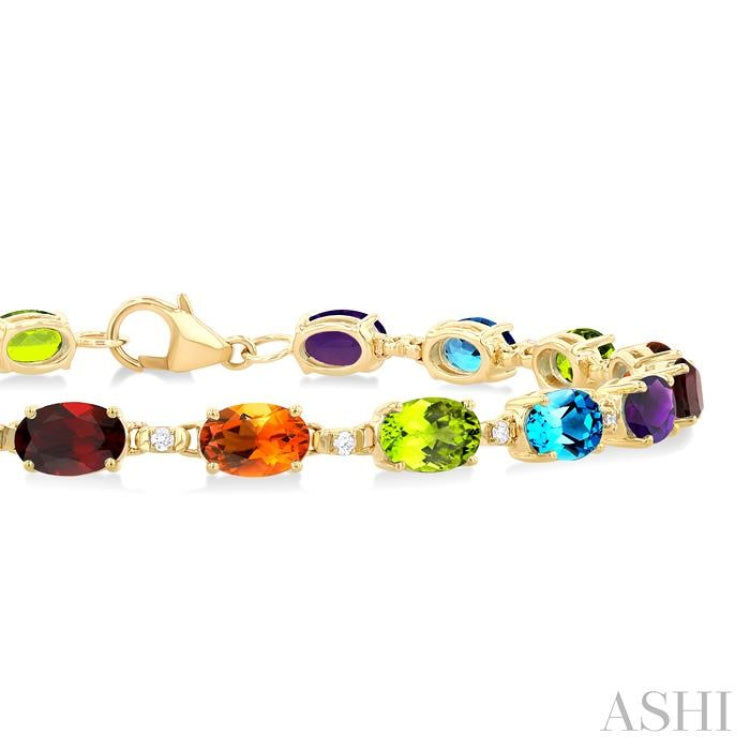 6X4 MM Oval Cut Multiple Gemstone and 1/6 Ctw Round Cut Diamond Semi-Precious Tennis Bracelet in 10K Yellow Gold 6X4 MM Oval Cut Multiple Gemstone and 1/6 Ctw Round Cut Diamond Semi-Precious Tennis Bracelet in 10K Yellow Gold