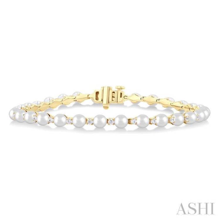 4 MM Cultured Pearl and 3/4 Ctw Round Cut Diamond Tennis Bracelet in 14K Yellow Gold 4 MM Cultured Pearl and 3/4 Ctw Round Cut Diamond Tennis Bracelet in 14K Yellow Gold