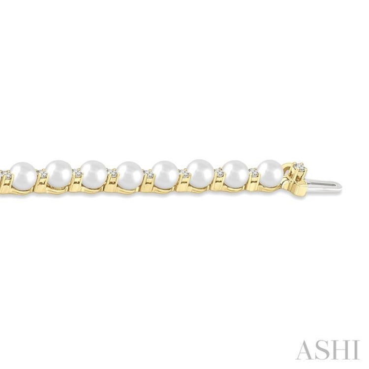 4 MM Cultured Pearl and 3/4 Ctw Round Cut Diamond Tennis Bracelet in 14K Yellow Gold 4 MM Cultured Pearl and 3/4 Ctw Round Cut Diamond Tennis Bracelet in 14K Yellow Gold
