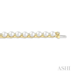 4 MM Cultured Pearl and 3/4 Ctw Round Cut Diamond Tennis Bracelet in 14K Yellow Gold 4 MM Cultured Pearl and 3/4 Ctw Round Cut Diamond Tennis Bracelet in 14K Yellow Gold