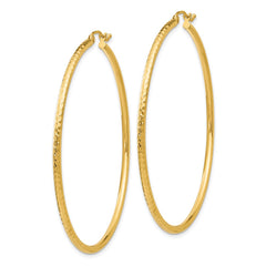 14k 2x55mm Diamond-cut Round Tube Hoop Earrings 14k 2x55mm Diamond-cut Round Tube Hoop Earrings