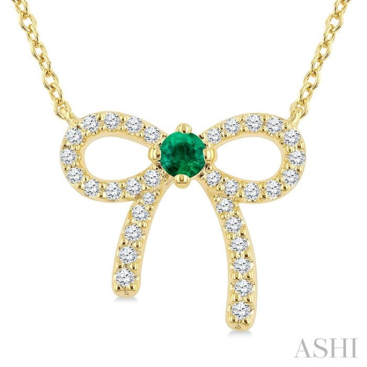 2.40 MM Round Shape Emerald and 1/8 Ctw Bow Round Cut Diamond Fashion Pendant With Chain in 10k Yellow Gold 2.40 MM Round Shape Emerald and 1/8 Ctw Bow Round Cut Diamond Fashion Pendant With Chain in 10k Yellow Gold