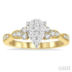 1/2 Ctw Pear Shape Center Criss-Cross Carved Shank Lovebright Round Cut Diamond Engagement Ring in 14K Yellow and White Gold 1/2 Ctw Pear Shape Center Criss-Cross Carved Shank Lovebright Round Cut Diamond Engagement Ring in 14K Yellow and White Gold