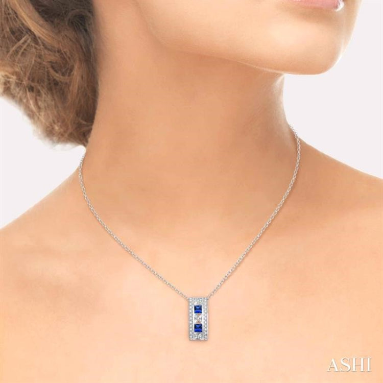 3x3 MM Princess Cut Sapphire and 1/5 Ctw Round Cut Diamond Precious Pendant in 14K White Gold with Chain 3x3 MM Princess Cut Sapphire and 1/5 Ctw Round Cut Diamond Precious Pendant in 14K White Gold with Chain