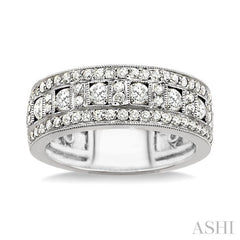 1 1/10 Ctw Channel Round Cut Diamond Wedding Band in 14K White Gold 1 1/10 Ctw Channel Round Cut Diamond Wedding Band in 14K White Gold