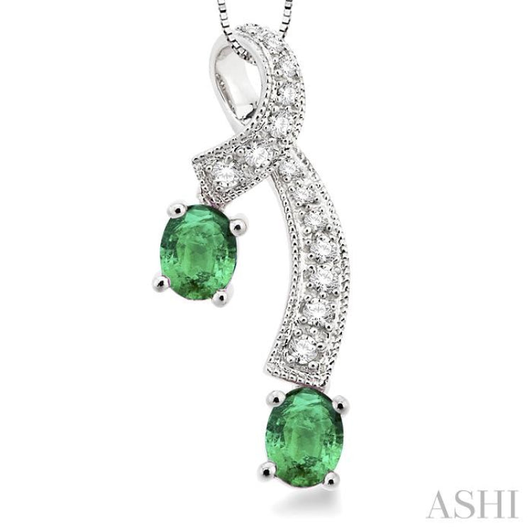 5x4 MM Oval Cut Emerald and 1/6 Ctw Round Cut Diamond Precious Pendant in 14K White Gold with Chain 5x4 MM Oval Cut Emerald and 1/6 Ctw Round Cut Diamond Precious Pendant in 14K White Gold with Chain