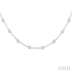 1 Ctw Bezel Set Round Cut Diamond Station Necklace in 14K White Gold 1 Ctw Bezel Set Round Cut Diamond Station Necklace in 14K White Gold