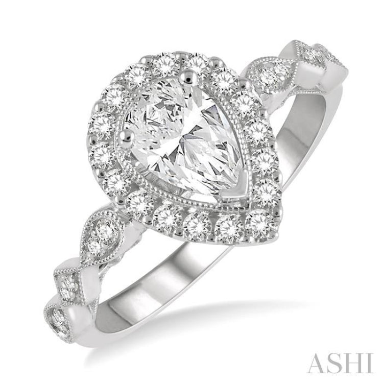3/4 ctw Carved Shank Round Cut Diamond Engagement Ring With 3/8 ct Pear Cut Center Stone in 14K White Gold 3/4 ctw Carved Shank Round Cut Diamond Engagement Ring With 3/8 ct Pear Cut Center Stone in 14K White Gold