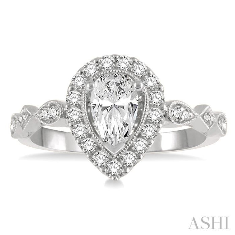 3/4 ctw Carved Shank Round Cut Diamond Engagement Ring With 3/8 ct Pear Cut Center Stone in 14K White Gold 3/4 ctw Carved Shank Round Cut Diamond Engagement Ring With 3/8 ct Pear Cut Center Stone in 14K White Gold