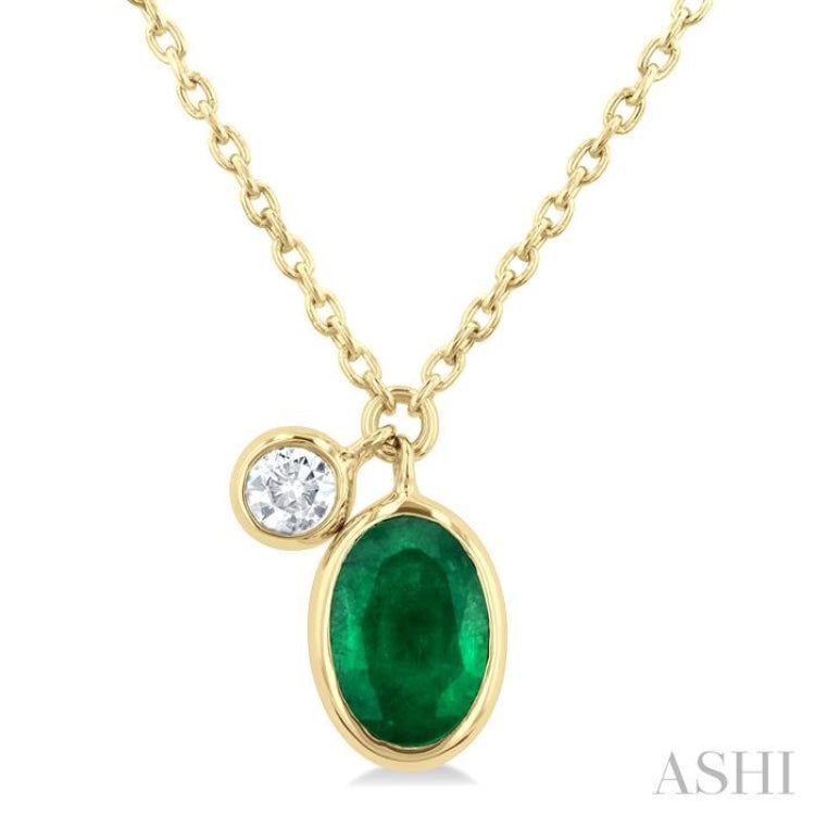 6x4 MM Oval Cut Emerald and 1/20 Ctw Bezel Set Round Cut Diamond Precious Pendant With Chain in 14K Yellow Gold 6x4 MM Oval Cut Emerald and 1/20 Ctw Bezel Set Round Cut Diamond Precious Pendant With Chain in 14K Yellow Gold