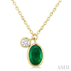 6x4 MM Oval Cut Emerald and 1/20 Ctw Bezel Set Round Cut Diamond Precious Pendant With Chain in 14K Yellow Gold 6x4 MM Oval Cut Emerald and 1/20 Ctw Bezel Set Round Cut Diamond Precious Pendant With Chain in 14K Yellow Gold