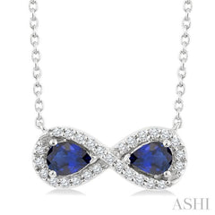 4X3 MM Pear Shape Sapphire and 1/10 Ctw Single Cut Diamond Precious Infinite Halo Pendant With Chain in 10K White Gold 4X3 MM Pear Shape Sapphire and 1/10 Ctw Single Cut Diamond Precious Infinite Halo Pendant With Chain in 10K White Gold