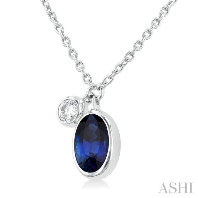 6x4 MM Oval Cut Sapphire and 1/20 Ctw Bezel Set Round Cut Diamond Precious Pendant With Chain in 14K White Gold 6x4 MM Oval Cut Sapphire and 1/20 Ctw Bezel Set Round Cut Diamond Precious Pendant With Chain in 14K White Gold