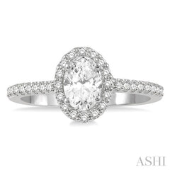 1 1/10 Ctw Oval Halo Round Cut Diamond Engagement Ring With 3/4 Ct Oval Cut Center Stone in 14K White Gold 1 1/10 Ctw Oval Halo Round Cut Diamond Engagement Ring With 3/4 Ct Oval Cut Center Stone in 14K White Gold