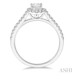 1 1/10 Ctw Oval Halo Round Cut Diamond Engagement Ring With 3/4 Ct Oval Cut Center Stone in 14K White Gold 1 1/10 Ctw Oval Halo Round Cut Diamond Engagement Ring With 3/4 Ct Oval Cut Center Stone in 14K White Gold