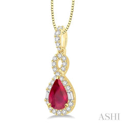 7x5 MM Pear Shape Ruby and 1/3 Ctw Diamond Precious Pendant in 14K Yellow Gold with Chain 7x5 MM Pear Shape Ruby and 1/3 Ctw Diamond Precious Pendant in 14K Yellow Gold with Chain