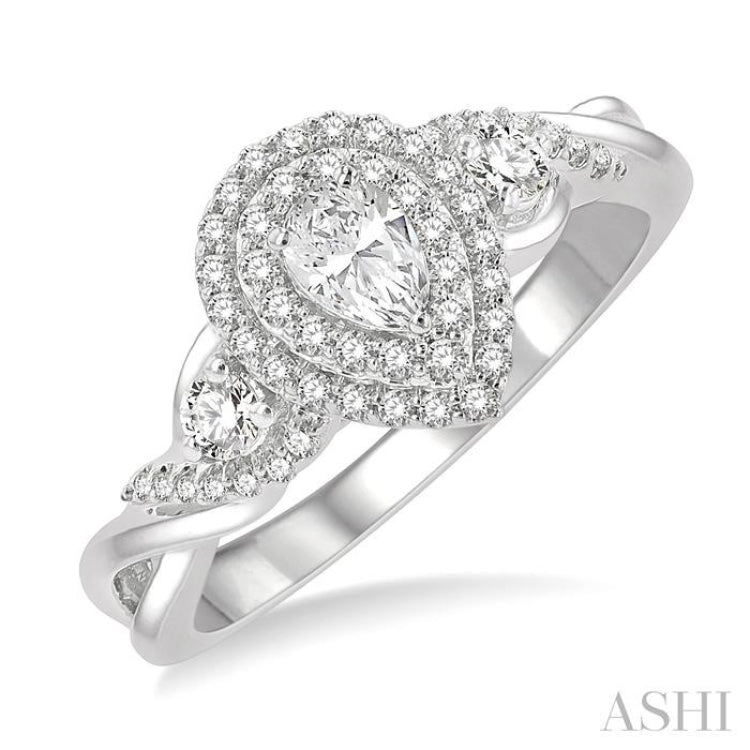 5/8 Ctw Split Twisted Shank Round Cut Diamond Engagement Ring With 1/4 Ct Pear Cut Center Stone in 14K White Gold 5/8 Ctw Split Twisted Shank Round Cut Diamond Engagement Ring With 1/4 Ct Pear Cut Center Stone in 14K White Gold