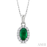 5x3 MM Oval Shape Emerald and 1/20 Ctw Single Cut Diamond Halo Precious Pendant with Chain in 10K White Gold