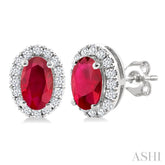 5x3 MM Oval Shape Ruby and 1/8 Ctw Single Cut Diamond Halo Precious Stud Earrings in 10K White Gold