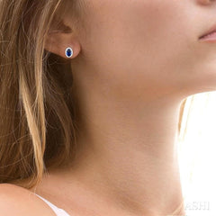 5x3 MM Oval Shape Sapphire and 1/8 Ctw Single Cut Diamond Halo Precious Stud Earrings in 10K White Gold 5x3 MM Oval Shape Sapphire and 1/8 Ctw Single Cut Diamond Halo Precious Stud Earrings in 10K White Gold