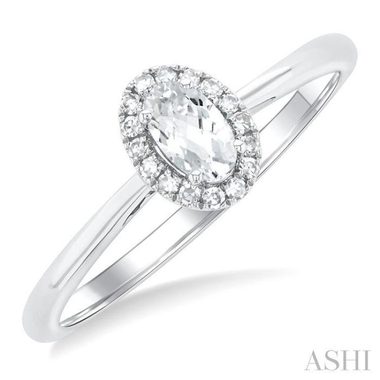 5x3 MM Oval Shape White Topaz and 1/20 Ctw Single Cut Diamond Halo Semi-Precious Ring in 10K White Gold 5x3 MM Oval Shape White Topaz and 1/20 Ctw Single Cut Diamond Halo Semi-Precious Ring in 10K White Gold