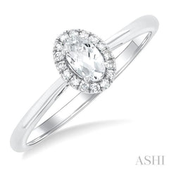 5x3 MM Oval Shape White Topaz and 1/20 Ctw Single Cut Diamond Halo Semi-Precious Ring in 10K White Gold 5x3 MM Oval Shape White Topaz and 1/20 Ctw Single Cut Diamond Halo Semi-Precious Ring in 10K White Gold