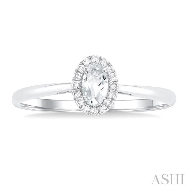 5x3 MM Oval Shape White Topaz and 1/20 Ctw Single Cut Diamond Halo Semi-Precious Ring in 10K White Gold 5x3 MM Oval Shape White Topaz and 1/20 Ctw Single Cut Diamond Halo Semi-Precious Ring in 10K White Gold