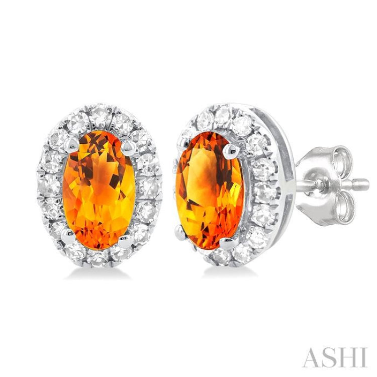 5x3 MM Oval Shape Citrine and 1/8 Ctw Single Cut Diamond Halo Semi-Precious Stud Earrings in 10K White Gold 5x3 MM Oval Shape Citrine and 1/8 Ctw Single Cut Diamond Halo Semi-Precious Stud Earrings in 10K White Gold
