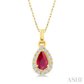 5x3 MM Pear Shape Ruby and 1/20 Ctw Single Cut Diamond Halo Precious Pendant with Chain in 10K Yellow Gold