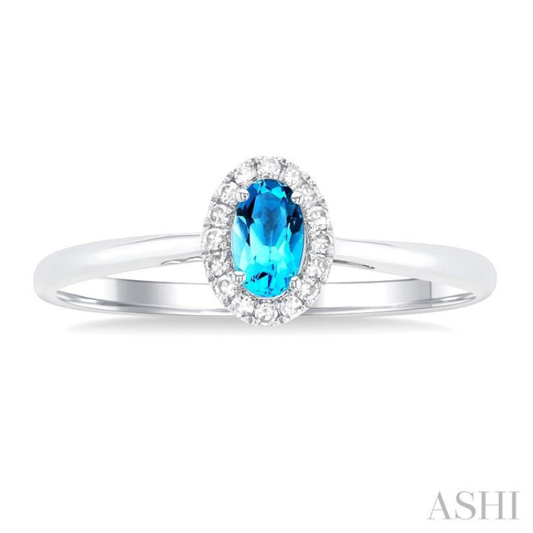 5x3 MM Oval Shape Blue Topaz and 1/20 Ctw Single Cut Diamond Halo Semi-Precious Ring in 10K White Gold 5x3 MM Oval Shape Blue Topaz and 1/20 Ctw Single Cut Diamond Halo Semi-Precious Ring in 10K White Gold