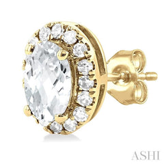 5x3 MM Oval Shape White Topaz and 1/8 Ctw Single Cut Diamond Halo Semi-Precious Stud Earrings in 14K Yellow Gold 5x3 MM Oval Shape White Topaz and 1/8 Ctw Single Cut Diamond Halo Semi-Precious Stud Earrings in 14K Yellow Gold