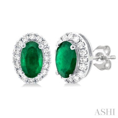 5x3 MM Oval Shape Emerald and 1/8 Ctw Single Cut Diamond Halo Precious Stud Earrings in 10K White Gold 5x3 MM Oval Shape Emerald and 1/8 Ctw Single Cut Diamond Halo Precious Stud Earrings in 10K White Gold