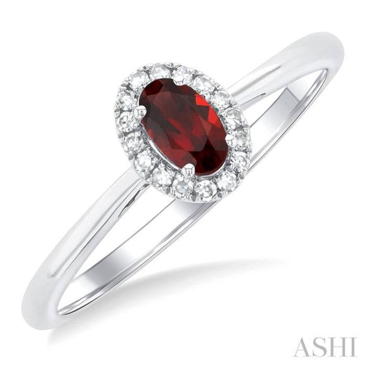 5x3 MM Oval Shape Garnet and 1/20 Ctw Single Cut Diamond Halo Semi-Precious Ring in 10K White Gold 5x3 MM Oval Shape Garnet and 1/20 Ctw Single Cut Diamond Halo Semi-Precious Ring in 10K White Gold