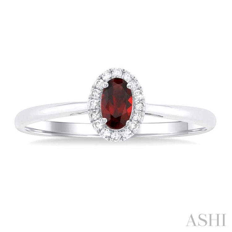 5x3 MM Oval Shape Garnet and 1/20 Ctw Single Cut Diamond Halo Semi-Precious Ring in 10K White Gold 5x3 MM Oval Shape Garnet and 1/20 Ctw Single Cut Diamond Halo Semi-Precious Ring in 10K White Gold