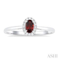 5x3 MM Oval Shape Garnet and 1/20 Ctw Single Cut Diamond Halo Semi-Precious Ring in 10K White Gold 5x3 MM Oval Shape Garnet and 1/20 Ctw Single Cut Diamond Halo Semi-Precious Ring in 10K White Gold