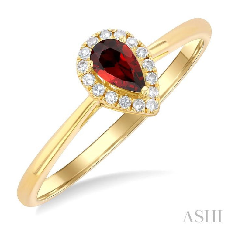 5x3 MM Pear Shape Garnet and 1/20 Ctw Single Cut Diamond Halo Semi-Precious Ring in 14K Yellow Gold 5x3 MM Pear Shape Garnet and 1/20 Ctw Single Cut Diamond Halo Semi-Precious Ring in 14K Yellow Gold