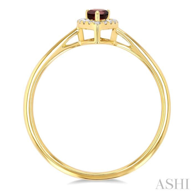 5x3 MM Pear Shape Garnet and 1/20 Ctw Single Cut Diamond Halo Semi-Precious Ring in 14K Yellow Gold 5x3 MM Pear Shape Garnet and 1/20 Ctw Single Cut Diamond Halo Semi-Precious Ring in 14K Yellow Gold