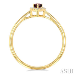 5x3 MM Pear Shape Garnet and 1/20 Ctw Single Cut Diamond Halo Semi-Precious Ring in 14K Yellow Gold 5x3 MM Pear Shape Garnet and 1/20 Ctw Single Cut Diamond Halo Semi-Precious Ring in 14K Yellow Gold