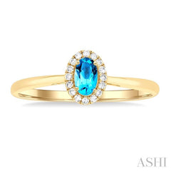 5x3 MM Oval Shape Blue Topaz and 1/20 Ctw Single Cut Diamond Halo Semi-Precious Ring in 14K Yellow Gold 5x3 MM Oval Shape Blue Topaz and 1/20 Ctw Single Cut Diamond Halo Semi-Precious Ring in 14K Yellow Gold