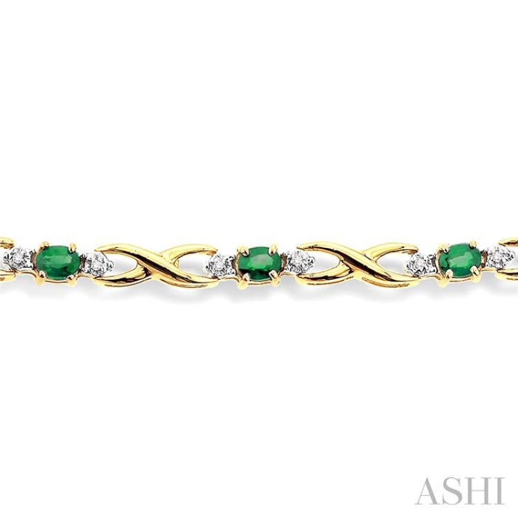 4x3 MM Oval Cut Emerald and 1/10 Ctw Single Cut Diamond Bracelet in 14K Yellow Gold 4x3 MM Oval Cut Emerald and 1/10 Ctw Single Cut Diamond Bracelet in 14K Yellow Gold
