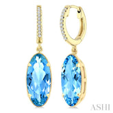 12X5 MM Evoque Gemstones Oval Shape Blue Topaz and 1/10 Ctw Round Cut Diamond Semi-Precious Earrings in 10K Yellow Gold