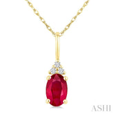1/50 Ctw Oval Cut 6X4 MM Ruby and Round Cut Diamond Precious Pendant With Chain in 10K Yellow Gold