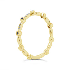 0.03ct Diamond and 0.03ct Blue Sapphire 14k Yellow Gold Lady's Band 0.03ct Diamond and 0.03ct Blue Sapphire 14k Yellow Gold Lady's Band