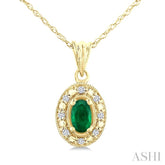 5x3 MM Oval Shape Emerald and 1/20 Ctw Round Cut Diamond Pendant in 14K Yellow Gold with Chain