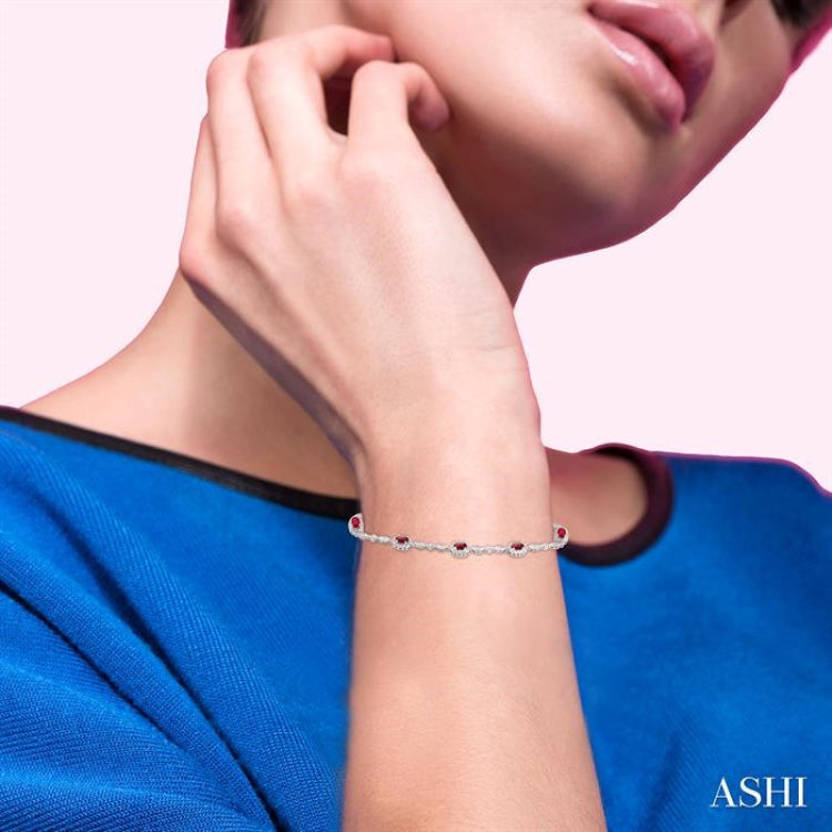 5x3 MM Oval Cut Ruby and 1/20 Ctw Single Cut Diamond Bracelet in 10K White Gold 5x3 MM Oval Cut Ruby and 1/20 Ctw Single Cut Diamond Bracelet in 10K White Gold